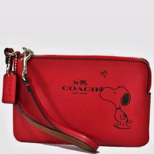 Coach Peanuts Snoopy leather corner zip wristlet
